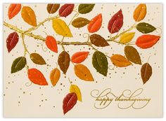 a happy thanksgiving card with colorful leaves on the branch and gold dots in the background