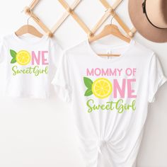 two t - shirts that say, mommy of one sweet girl and one mom of one sweet girl