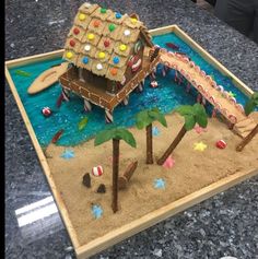 a house made out of sand on top of a table