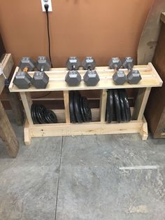 two wooden tables with some electrical equipment on them