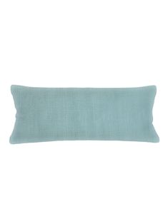 a light blue pillow on a white background