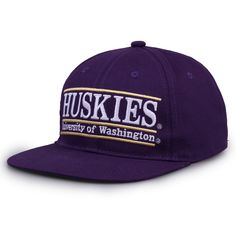 a purple hat with the words huskies on it