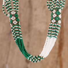 This gorgeous long torsade necklace is the creation of Angelina Roquel from Guatemala. The artisan strings tiny glass beads by hand to create complex patterns in kelly green white and bronze. Accessories Necklace, Kelly Green, Hand Beading, Embroidered Friendship Bracelet, Women's Accessories, Glass Beads, Beaded Bracelets, Jewelry Necklaces, Beads