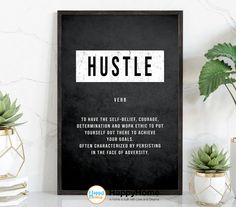 a black and white poster with the words hustle on it next to potted plants