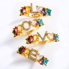 Lovely Letter Ring with beautiful design! Fresh and fun look! This is a very unique and cute ring.  Perfect for best friends, teens, and love ones.   It is also very colorful and solid.  Gold plated Copper.Whether for yourself or a gift for someone, this is a very easy to pick and friendly gift for love ones.   Suitable for any occasions, such as birthdays, graduations, anniversaries, and special holidays. Color: 18K gold plated copper, Product material: colored zircon + copper Product size: 2.0cm in diameterDiameter：2.0cm Shipping: This product takes 7-15 to ship to your home (after processing / handmade which takes 7-10 days). Open Cuff Ring, Wholesale Jewelry Supplies, Wholesale Accessories, Letter Ring, Earring Trends, Adjustable Jewelry, Sparkle Jewelry, Initial Ring, Gifts For My Wife