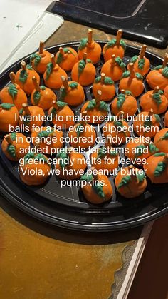 there are many small pumpkins on the tray