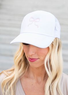 White embroidered bow hat with pink bow Cute White Snapback Hat With Curved Brim, White Trucker Hat With Embroidered Logo For Spring, Cute White Baseball Cap, White Embroidered Trucker Hat With Curved Brim, Spring Hats With Curved Visor, Trendy White Embroidered Hat, White Embroidered Hat With Curved Bill, White Embroidered Hat One Size, Embroidered Bow