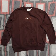 Nike Sportswear Phoenix Fleece Oversized Crew Neck Sweatshirt Women's Size Small Fleece Long Sleeve Sports Sweatshirt, Long Sleeve Fleece Sweatshirt For Sports, Brown Sporty Sweater For Streetwear, Sporty Brown Sweater For Streetwear, Oversized Crew Neck Hoodie For Sportswear, Oversized Crew Neck Hoodie In Sportswear Style, Sporty Brown Long Sleeve Tops, Brown Relaxed Fit Sporty Sweater, Casual Long Sleeve Sweatshirt For Sports