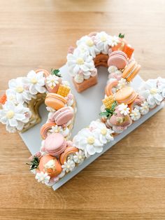 there is a letter made out of cookies and flowers