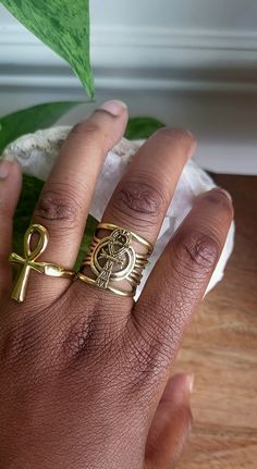 Beautiful gold detailed Ankh ring.  Crafted with many cutout details.  Store in a dry and cool space. (This is specifically for the ankh ring with the cutouts)  Again, only ONE ring is included. Please sure to look at the multiple photos in the listing.  Ankh ring, Egyptian Jewelry,  African Jewelry, African adornments Ankh Jewelry, Ankh Ring, The Ankh, Feminine Health, Brass Bangle, Egyptian Jewelry, Waist Beads, Ringe Gold, Dope Jewelry