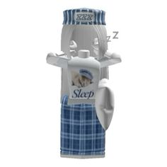 a white and blue toothbrush holder with a sleeping dog on it's back