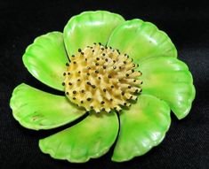 "C1960's Original by Roberts Green Enameled Flower with Yellow Center A beautiful addition to the spring collection. The pin is in very good condition and measures 2-1/8\" across. The leaves are lime green over the yellow background. Roberts cartouche on back. The blossom center are spikes of yellow with tiny black tips." Spring Green Brooch Gift, Green Spring Brooches As Gifts, Green Spring Brooches Perfect As A Gift, Green Spring Gift Brooches, Green Flower-shaped Enamel Brooch Pin, Green Flower Shaped Enamel Pin Brooch, Green Flower Enamel Pin Brooch, Mid-century Green Brooch As A Gift, Vintage Green Flower Brooches