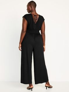 Chic V-neck Jumpsuits And Rompers With Smocked Back, V-neck Jumpsuits And Rompers With Smocked Back For Vacation, Stretch Jumpsuits And Rompers With Smocked Back, Black Sleeveless Jumpsuits With Smocked Back, Casual Sleeveless Jumpsuit With Elastic Back, Casual Sleeveless Jumpsuits And Rompers With Elastic Back, Casual Solid Color Jumpsuits With Tie Back, Casual Jumpsuits And Rompers With Tie Back, Casual Solid Color Jumpsuits And Rompers With Tie Back