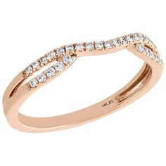 a rose gold wedding ring with diamonds on the side and an arrow design in the middle