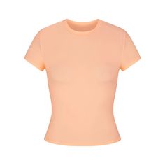 We perfected the t-shirt. Made with our signature buttery-soft fabric with incredible stretch and a second-skin feel, this versatile tee molds to your body for the most flattering fit whether you’re dressing it up or down. Features a classic crew neck and short sleeves. Fits true to size. Cropped Tee Shirt, Mesh T Shirt, Ladies Tee Shirts, Grey Shirt, Yellow Orange, Color Orange, Classy Outfits, T Shirt Top, Cotton Tshirt