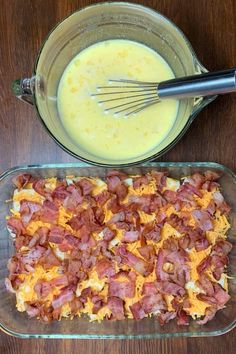 a casserole dish with eggs and bacon in it next to a bowl of batter