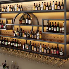 a wine rack filled with lots of bottles and glasses next to a wall mounted clock