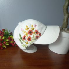 Hand Embroidery Baseball Cap, Wild Flower Embroidered Baseball Cap, Summer Women Hat, Embroidered Hat, Hat For Women, FLower Hat, Gift for Her, Gift for Mom, Birthday Gift. 📍Product details: Design: hand embroidered with beautiful wild flowers, daisy. Cap size (head circumference): 55 - 60 cm; Fabric: 100% cotton  📍Products are hand-embroidered entirely from Vietnamese craftsmen. Each stitch is meticulously embroidered, the colors are harmonious. Please store the hat in a dry place, if you nee White Embroidered Visor Baseball Cap, White Embroidered Hat One Size, White Embroidered Trucker Hat With Curved Brim, White Hats With Floral Embroidery For Spring, White Curved Brim Hat With Embroidery, White Embroidered Hat With Curved Brim, White Floral Embroidered Hats For Spring, White Embroidered Curved Brim Hat, White Floral Embroidered Spring Hat