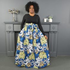 This  African  prints  maxi  skirt  is  a  statement  piece  for  any  wardrobe.  It  features a  bold,  vibrant  African-inspired  print  with  intricate  details.  The  skirt  has  a comfortable  high  waistband  and  deep  pockets,  allowing  you  to  store  your essentials  while  looking  stylish.  The  full-length  silhouette  is  perfect  for  any occasion,  from  casual  days  to  formal  events. Skirt  length  is  74cm  and  comes  with  a  waist  band  tie  of  274 cm  long  that  can  be  tie  round  the  waist  to  make  a  bow  tie  and  can also  be  use  for  a  headband  and  perfect  for  any  season. ONE UNIQUE SIZE ELASTIC WASIT BAND WAIST BELT DETACHEDABLE 2 DEEP POCKETS 100% WAX PRINT COTTON SIZES  M - L - 2XL- 3XL - 4XL - 5XL AVAILABLE LENGHT LONG MAXI SKIRT MODEL IS Non-stretch Multicolor Bohemian Maxi Skirt, Traditional Maxi Skirt For Spring, Make A Bow Tie, Skirt Maxi, African Print Maxi Skirt, Maxi Skirts, African Print Skirt, Hot Iron, Printed Maxi Skirts