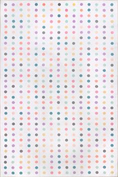 a colorful polka dot pattern on white paper