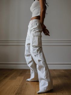 Chic and trendy wide leg utility cargo pants made from luxe heavy textured cotton rayon blend. Model is in MINUSEY S. ✔️ Free worldwide express shipping over $100✔️ Loved by 6,500+ customers✔️ Limited edition collections, maximum style⠀⠀⠀⠀⠀⠀⠀⠀⠀Stay ahead of the trend with can’t-find-anywhere-else staples. Your closet will thank you 💕 * MINUSEY S = EU 34, US 2* MINUSEY M = EU 36, US 4* 52% Cotton / 43% Rayon / 5% PU* Dry clean* Made in Korea - Model Height: 169cm/5'6" (US2, EU34) Quilted Parka, The Frankie Shop, Long Puffer, Frankie Shop, Utility Pants, Faux Leather Pants, Pants Outfit, Model Height, Cargo Pants