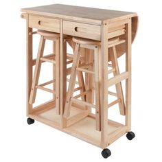 a kitchen island with two stools on it's sides and one drawer at the top