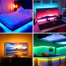 there are four pictures with different lighting in the same room and one has a bed