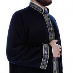 Elegant Prayer Jubba, lightweight and traditional looking will be a great use for Ramadan, Eids, Mawleed, Graduations, Wedding, Engagement or Daily Prayers ◦ Color: Navy Blue ◦ Style: Bordered ◦ Material: Cotton&Polyester A gorgeous jubbah that will bring you to the forefront with the special bordered embroidery details. A perfect jubbah model for muslim mens who cares about their appearance and have a great taste and style. ✤ Features ✤ * Dominant collar * Half lined jubbah * Traditional Ot Royal Ceremonial Sets For Eid, Royal Ceremonial Eid Sets, Blue Formal Thobe For Eid, Ceremonial Long Sleeve Abaya For Eid, Long Sleeve Ceremonial Abaya For Eid, Long Sleeve Abaya For Ceremonial Eid, Royal Long Sleeve Traditional Wear For Ceremonial Occasion, Royal Long Sleeve Ceremonial Traditional Wear, Royal Long Sleeve Ceremonial Sets