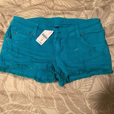 Nwt Carmar Denim Shorts Teal Color Denim Cutoff Style Bought At Lf Store Classic Cutoff Mid Rise Short Zipper Fly Brand New, Never Worn With Tags Size 25 Blue Ripped Cotton Bottoms, Ripped Blue Cotton Bottoms, Blue Jeans With Frayed Hem Short Leg, Blue Jean Shorts With Pockets, Blue Cutoff Jean Shorts With Pockets, Blue Fitted Cutoff Jean Shorts, Blue Bottoms With Frayed Hem And Short Leg, Blue Bottoms With Frayed Hem Short Leg, Blue Cotton Bottoms With Frayed Hem