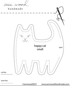 a paper cut out of a cat with the words happy cat small on it