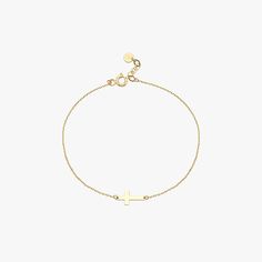 Embrace contemporary elegance and spirituality with our Sideways Cross Bracelet, meticulously crafted from 14K solid gold. This modern piece reimagines the traditional symbol of faith with a cross placed horizontally along a delicate chain, offering a fresh and stylish expression of belief. Perfect for daily wear or as a thoughtful gift, it's a subtle yet powerful reminder of faith and personal journey. Material: 14K Solid Gold Bracelet Length: 7 inches (extension chain 0.6 inches) Adjustable go Elegant Yellow Gold Rosary Bracelet With Cross, Elegant Yellow Gold Cross Rosary Bracelet, Elegant Cross Pendant Bracelet As A Gift, Gold Cross Bracelet, Solid Gold Bracelet, Delicate Chain, Personal Journey, Cross Bracelet, Gold Cross