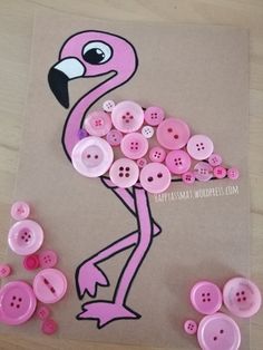 a pink flamingo is surrounded by buttons