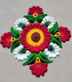 an image of a colorful flower design on the floor