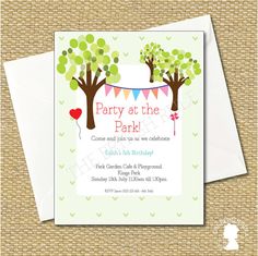 the party at the park is set up on top of a card with an envelope