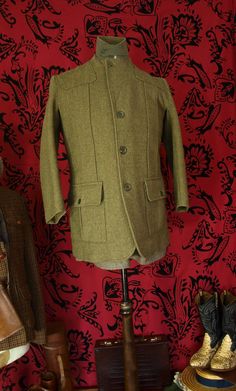 More items on www.newfanglednatty.com You can not get any better than these Zacharias  vintage Derby Tweed sporting jackets, fully loaded design as described below: The jacket is in  Grey Olive hard wearing Derby Tweed. There is a water resistant 'drop liner' made from a luxury thick Viscose.  A drop liner so called because it is attached at the top of the garment but not at the bottom to allow water that soaks through the tweed outer layer to run off.  The jacket has the quality Norfolk jacket Winter Tweed Jacket With Lapel Collar And Flap Pockets, Fitted Winter Blazer For Outdoor, Vintage Khaki Outerwear With Lapel Collar, Vintage Wool Outerwear With Buttons, Wool Stand Collar Blazer With Pockets, Wool Blazer With Stand Collar And Pockets, Vintage Stand Collar Blazer For Fall, Vintage Fall Blazer With Stand Collar, Vintage Stand Collar Winter Blazer