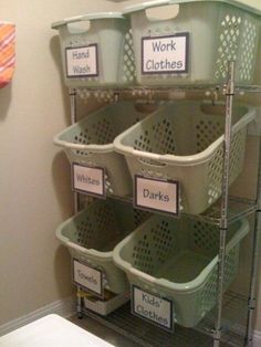 the shelves are organized with baskets and labels