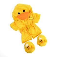 a yellow ducky bathrobe and three rubber ducks