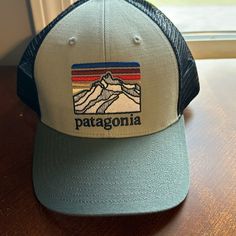 Patagonia Trucker Hat. Brand New-Has Never Been Worn. Patagonia Cap, Patagonia Trucker Hat, Patagonia Fleece Vest, Patagonia Sweatshirt, Patagonia Logo, Patagonia Fleece Pullover, Patagonia Vest, Line Logo, Military Pants