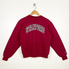 Vintage NCAA Stanford University Cardinal Crewneck Sweatshirt Print Logo Red Color Men's S - Made in Honduras  - Materials : Cotton, Polyester  - Tag Reads : S Kindly see the actual measurements (All measurements were taken lying flat) - Actual size manual measurements * Width (Armpit to armpit) : 20 inches * Length (Shoulder to end of garment) : 24 inches * Sleeve length : 24 inches - Condition : * Good condition 9/10 (90%) * Free from any tear and major defect - Shipping : * DHL EXPRESS = 3-6 business day arrived * Please PROVIDE your PHONE/CONTACT NUMBER for SHIPPING/DELIVERY purpose DON'T FORGET TO VISIT MY SHOP FOR MORE GREAT STUFF, THANK YOU. Red Varsity Top With Ribbed Cuffs, Vintage Red Crew Neck Tops, University Red Crew Neck Top For Streetwear, Vintage Red T-shirt For Winter, Red Collegiate Cotton Sweater, Sporty University Red Crew Neck Sweatshirt, Red College Sweater With Ribbed Cuffs, Red Crew Neck Top With Ribbed Cuffs, University Red Varsity Crew Neck Sweatshirt