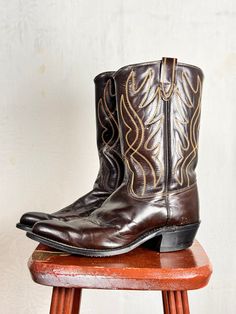 An authentic vintage pair of ACME cowboy boots with classic embroidery, a slightly pointed toe, and natural patina. made in USA era : 1970s material : leather color : espresso brown condition : distressed, appropriate signs of age and wear as seen in photos size : mens 8.5 D , please compare measurements below approximate measurements : heel height : 1.75" shaft height : 9" total height : 12.5" - - - - - - - - - - - - - - - - - - - - - - - - - - - - - - - - - - - - - - - -  INTERNATIONAL SHIPPING AVAILABLE UPON REQUEST Craft Union does NOT accept returns or exchanges, all items are FINAL SALE Please consider the following prior to placing an order : Because measurements are provided, Craft Union does NOT grant refund/exchange requests if an item does not fit. We are always happy to assist Embroidered Cowboy Boots, Classic Embroidery, Cowboy Boots Mens, Vintage Cowboy Boots, Espresso Brown, Boots Mens, Vintage Cowboy, Louisville Kentucky, Cowboy Western