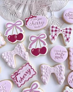 decorated cookies are displayed on a table