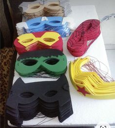 there are many different types of masks on the table