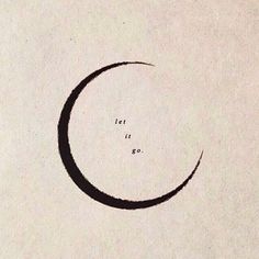 a black circle with the words let it go written on it in cursive writing