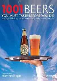 a person holding a tray with beer on it and the cover of a book titled, 1001 beers you must taste before you die