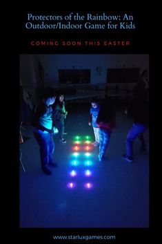 three children are playing with colored lights in the dark, and one child is standing next to an adult