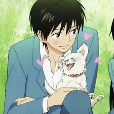 two anime characters sitting next to each other holding a white dog in their hands and looking at the camera