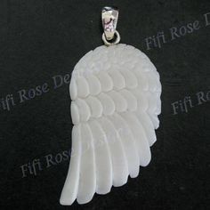 "2 1/8\" Handcarved Eagle Angel Wing Bison Bone 925 Sterling Silver Pendant This pendant made of bison bone is entirely handcarved by our master artisan carvers. We hand select each piece to assure that the quality of the detail and relief is exceptional. Receive quickly, shipped from the US, satisfaction guaranteed. Bail Size: ~5mm(1/4\") Silver Type: 925 Sterling Silver Pendant Size: 55x35mm(2 1/8x1 3/8\")w/bail Pendant Weight: ~6grams(0.2oz) Pendant Material: Bison bone Price: 21.95" White Carved Spiritual Jewelry, Sterling Silver Pendant, Angel Wings, Sterling Silver Pendants, Pendant Necklaces, Silver Pendant, Bones, Hand Carved, 925 Sterling Silver