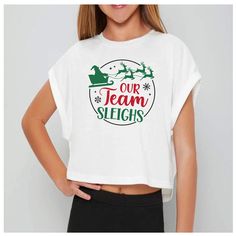 Cheer Christmas Crop Shirt- Our Team Sleighs- Cheer Christmas Crops -Cheer HolidayTees This white crop top has a fun Christmas  design. This one comes in yuth and adult sizes.Great for the holiday season. True to size. This can also be made on a full length tee in sizes infant- adult. This design is printed directly to the garment, not a vinyl! https://www.etsy.com/shop/dreamingdandelions?ref=seller-platform-mcnav&section_id=25880749 Free shipping is included. Fun Christmas, White Crop, White Crop Top, Crop Shirt, Christmas Design, Kids Tops, Cincinnati, Christmas Fun, The Holiday