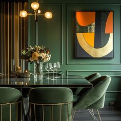 an elegant dining room with green walls and gold trimmings on the table, surrounded by velvet upholstered chairs