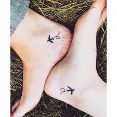 two people with small tattoos on their feet